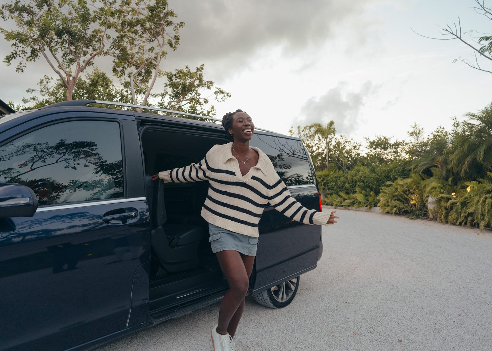 Guest arriving in a luxury Mercedes V-Class private transfer in the Riviera Maya